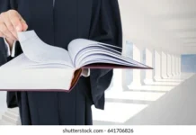 20 से ज्यादा वकीलों पर बड़ा एक्शन लिया लाइसेंस सस्पेंड। digital composite midsection judge holding 260nw 641706826 2