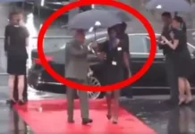 प्रधानमंत्री ने अधिकारी से छीना छाता, बारिश में भीगने को छोड़ा। 3065487 untitled 8 copy